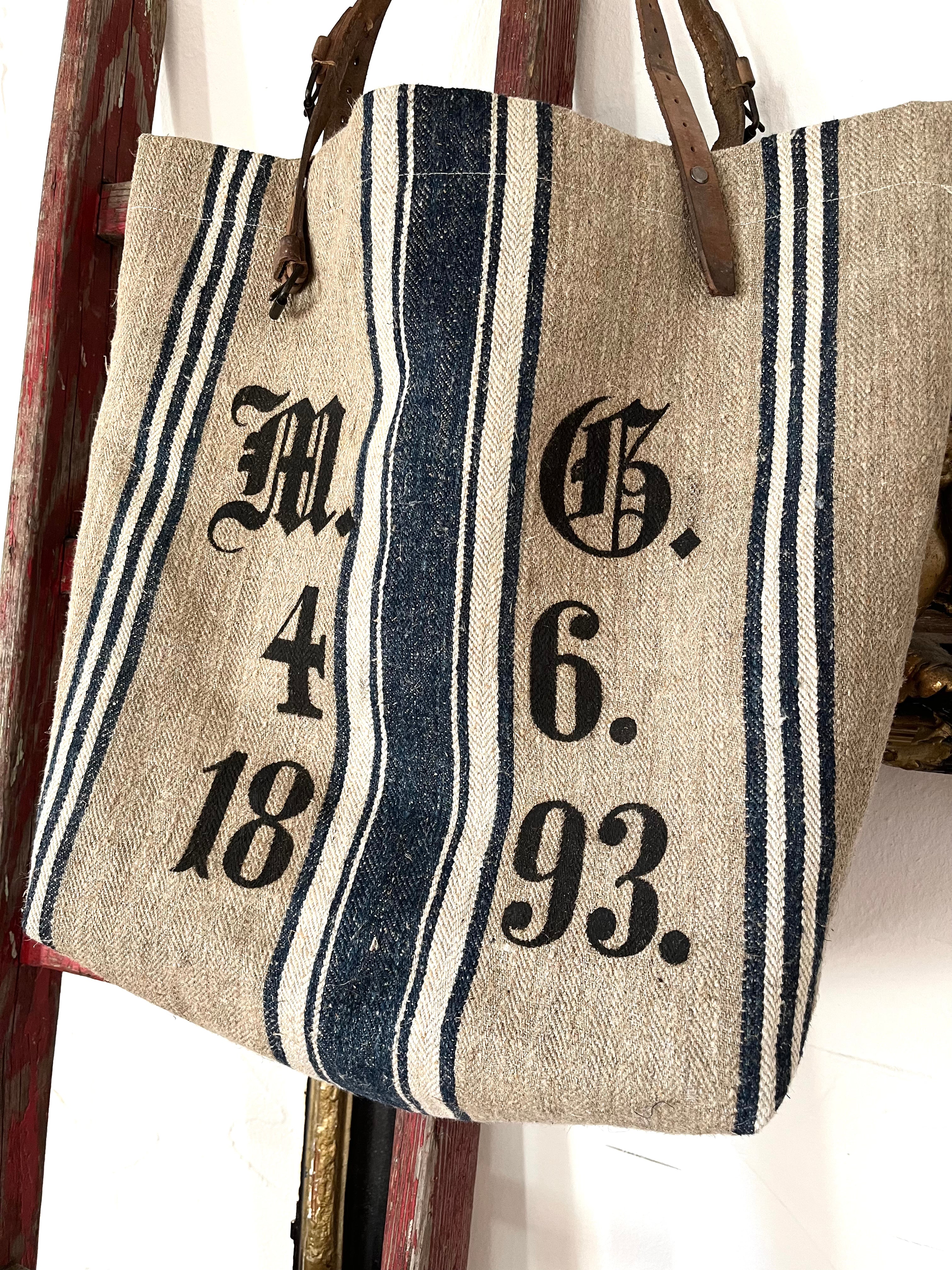1893: Shopper aus sehr altem Leinensack mit Aufschrift und blumigem Innenleben